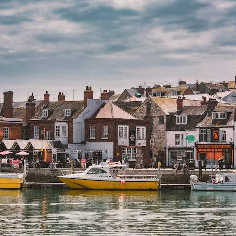 People-watch at Weymouth Harbour, located closeby