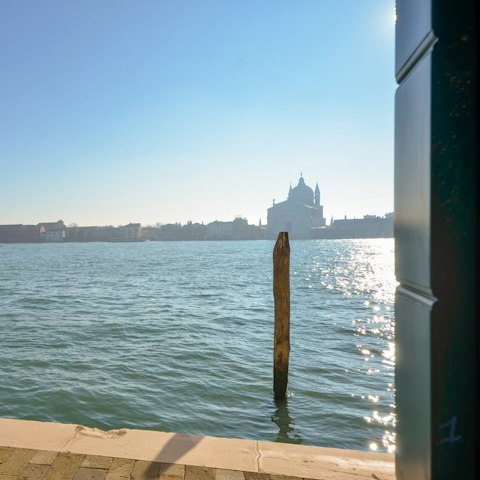Enjoy views of the Giudecca Canal and Church of the Redentore from your apartment