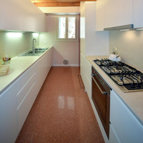 Prepare meals or snacks from the convenient kitchen