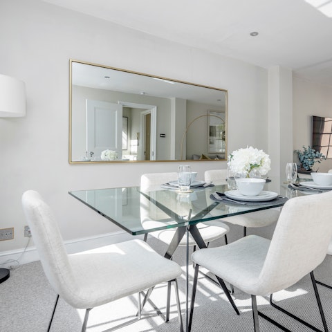 Gather for family meals at the modern dining table