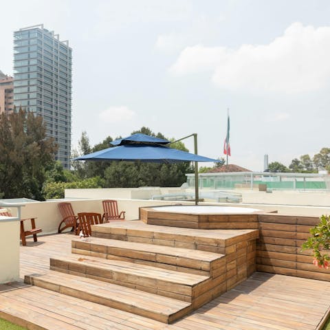 Take a relaxing soak in the shared Jacuzzi