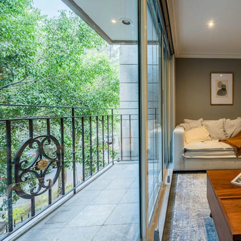 Enjoy a morning coffee on the private balcony
