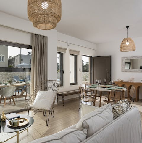 Cosy up in the stylish open–plan living/dining area and indulge in some chill time