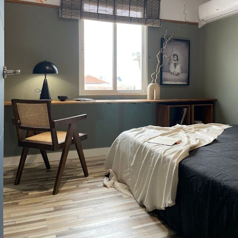 Catch up on work at the second bedroom's long desk