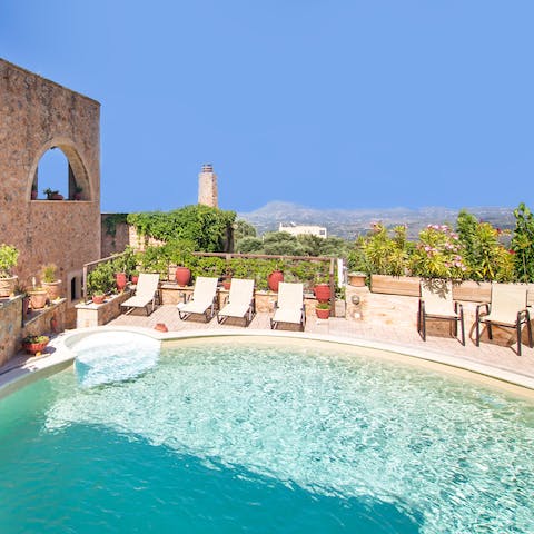 Soak up the sun from a lounger or take a dip in the on-site pool