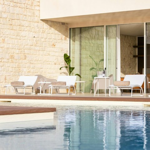 Can some sun by the swimming pool