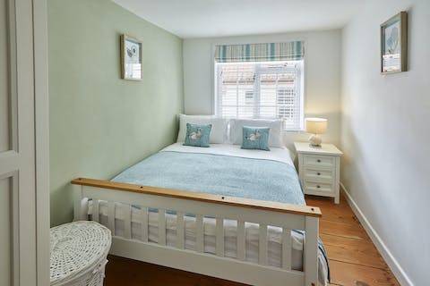 Wake in your seaside-inspired bedroom, ready for another day on the coast