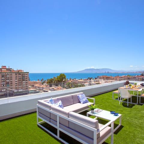 Relax on the sofas with a gorgeous view of the coastline