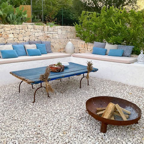 Light a fire and snuggle up in your luxurious seating area as the sun sets