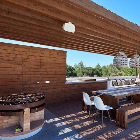 Dine alfresco with the outdoor kitchen and barbecue