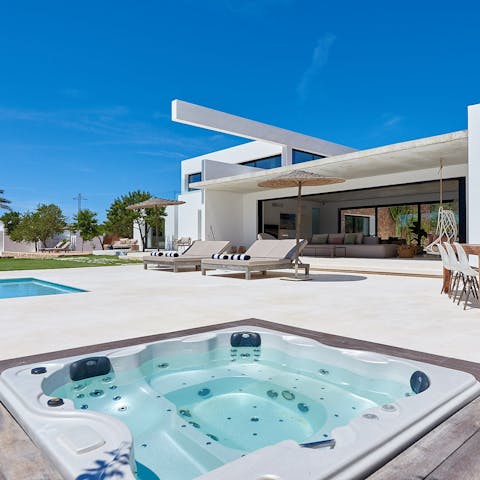 Spend evenings unwinding in the jacuzzi