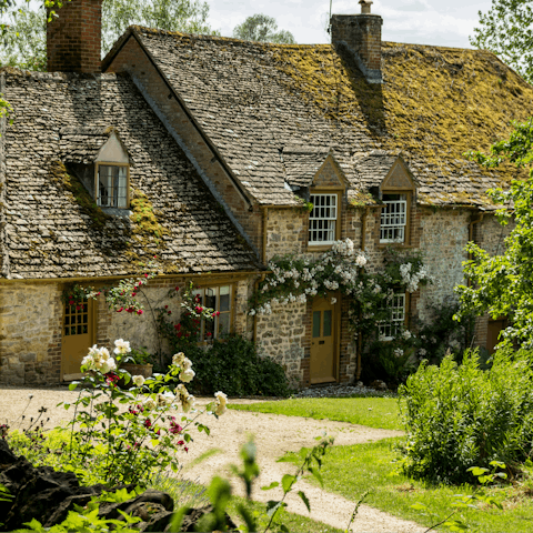 Bask in the beauty of the local architecture –  a subtype of the Tudor Revival style