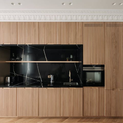 Fire up the coffee pod machine in the sleek, modern kitchen