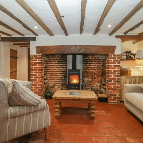 Spend cosy evenings relaxing by the wood burning stove
