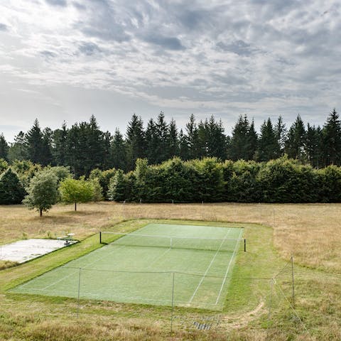 Thrash an opponent on the private tennis court