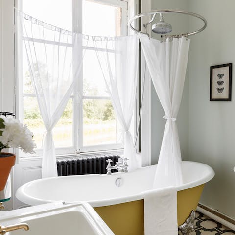 Relax with a long soak in the roll-top bath