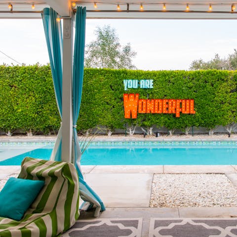 Cosy up in the cabana while the others make a splash in the pool