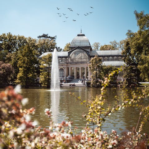 Embrace nature with a stroll around nearby El Retiro Park