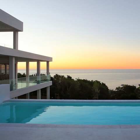 Take in the blissful South African sunset from the private swimming pool