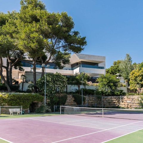Work up a sweat on the private tennis court