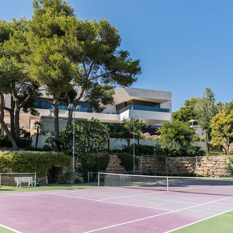 Work up a sweat on the private tennis court