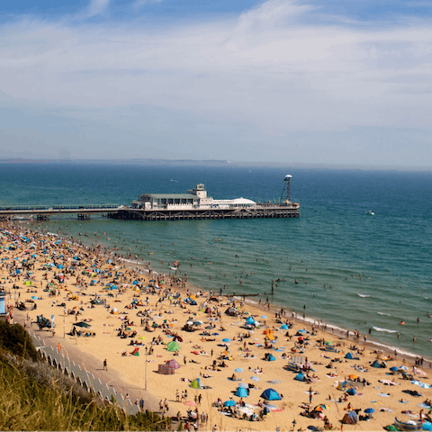 Head to Bournemouth's bustling beachfront and soak up the rays with an ice cream in–hand