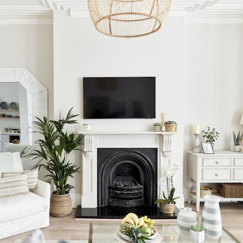 Cosy up in front of the period fireplace with a creamy coffee and some tasty snacks