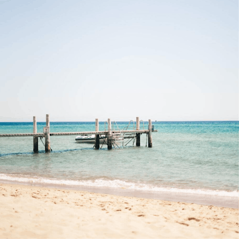 Sink you toes into the sand and breathe in the sea air at nearby Herzliya beach