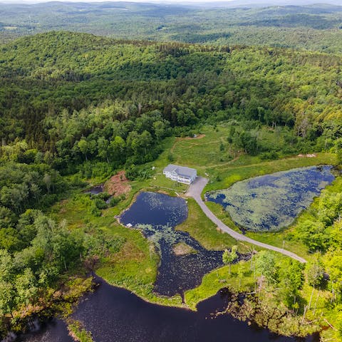 Stay in Wilmington on a secluded 22- acre plot surrounded by ponds and woodland