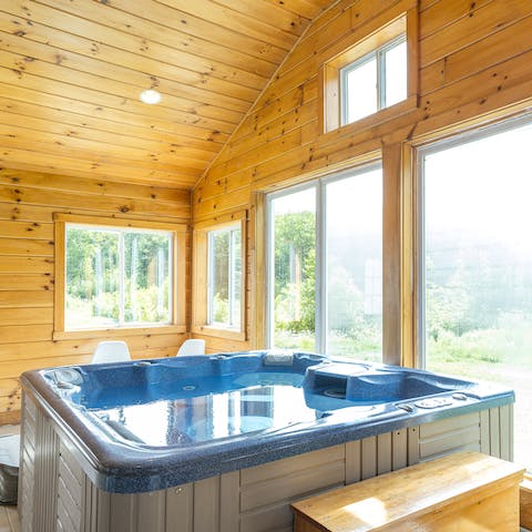 Warm up in the bubbling hot tub after a day of skiing at Mount Snow
