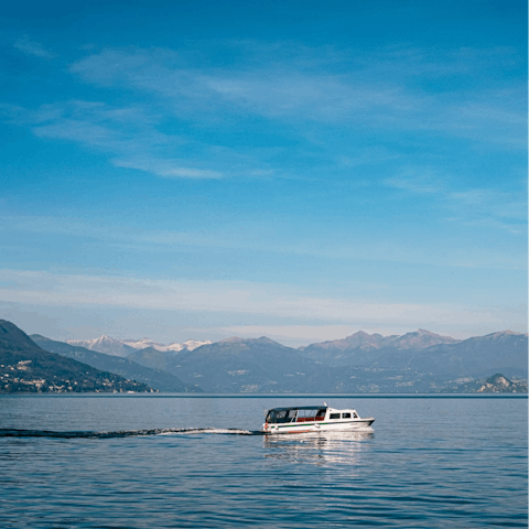 Let your host charter a boat for you to explore Lake Como