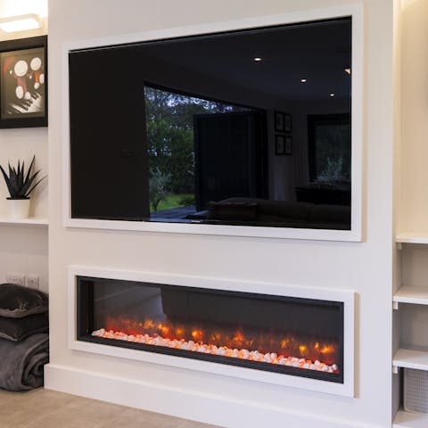 Light up the fire and enjoy a tumbler of whisky on the rocks after dark