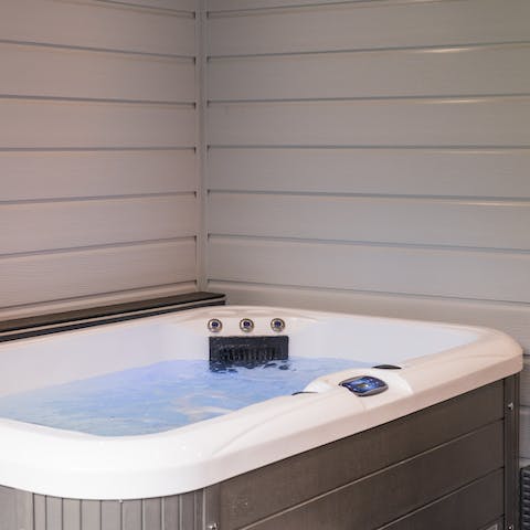 Soak in the hot tub on a chilly afternoon before heading out for dinner