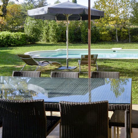 Organise an alfresco feast on the wicker dining furniture
