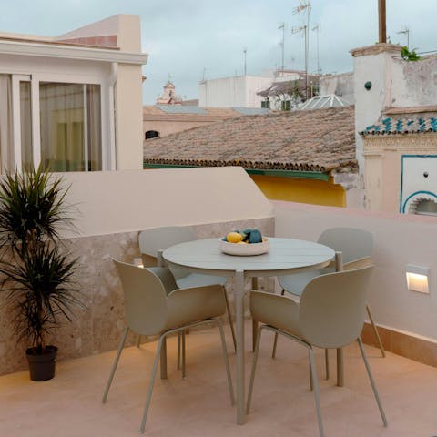 End your day with dinner under the stars on the shared rooftop terrace