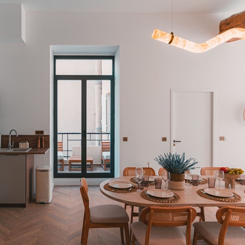 Enjoy a glass of Provence rosé wine at the dining table