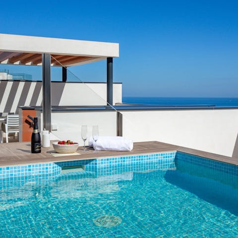 Head up to the roof terrace for a swim in the private pool