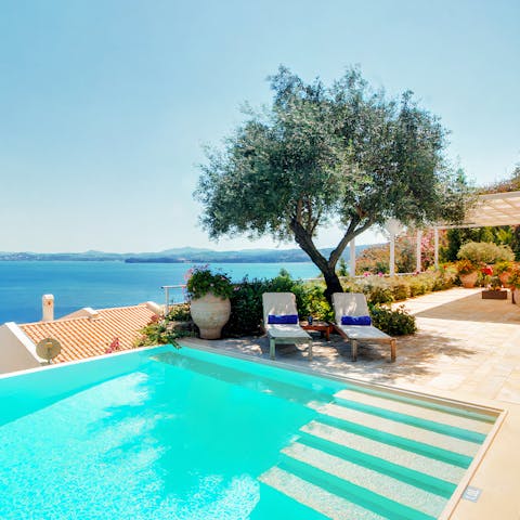 Enjoy a swim in the private pool for some respite from the Greek sun