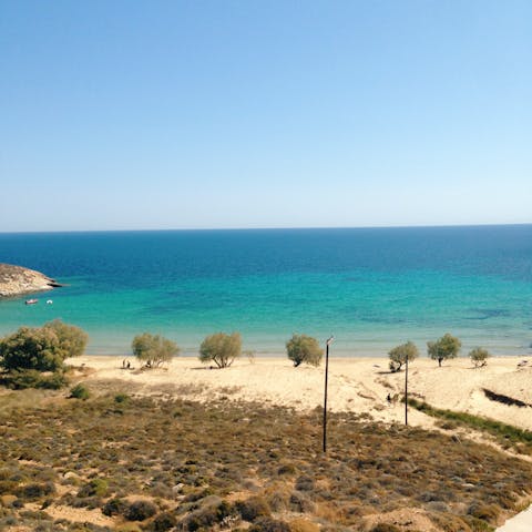 Soak up the sun at Barbati beach, a fifteen-minute walk away