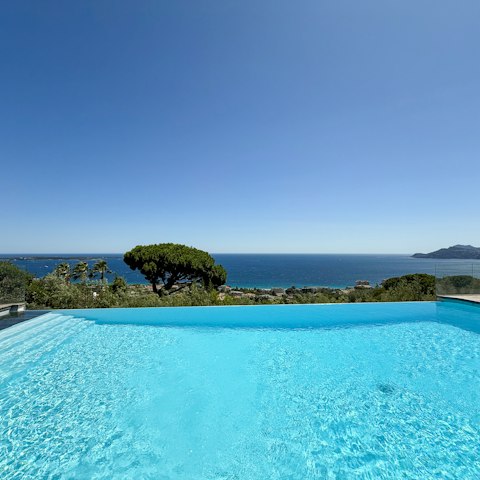 Enjoy sunshine and sea views as you swim in the pool