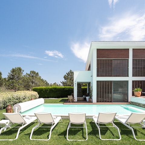 Enjoy the magic of doing nothing while relaxing by the pool