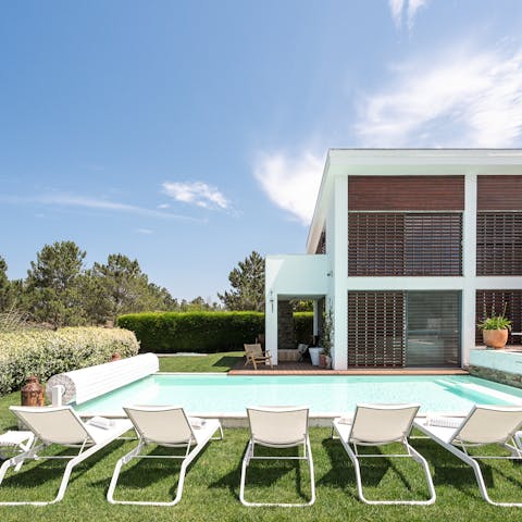 Enjoy the magic of doing nothing while relaxing by the pool