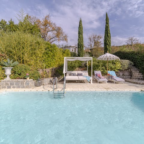 While away sun-soaked afternoons by your glistening pool