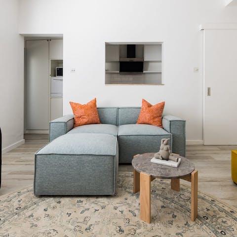 Relax and watch Netflix with a glass of wine after a long day in the city