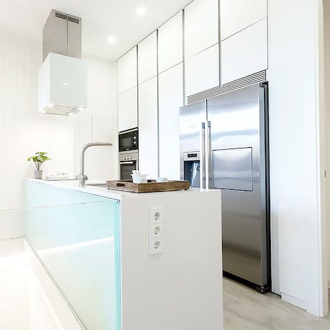 Rustle up a delicious dinner in the sleek, modern kitchen