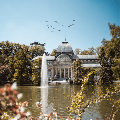 Soak up the green oasis of Retiro Park, a short distance away