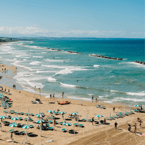 Take a three-minute stroll down to Spiaggia Libera San Lorenzo Reitani