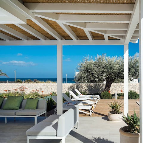 Take advantage of the outdoor space for sunbathing and dining