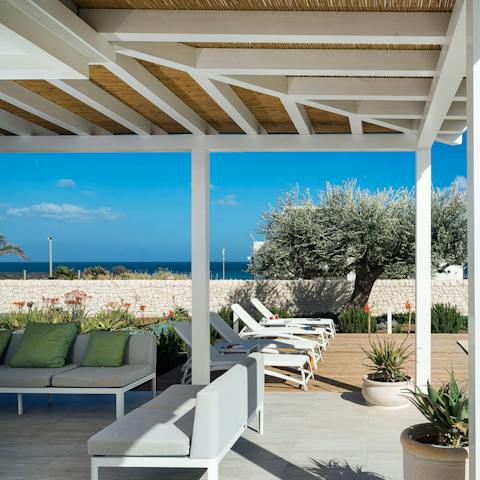 Take advantage of the outdoor space for sunbathing and dining