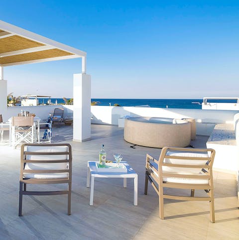 Head onto the rooftop terrace to enjoy the hot tub with a view